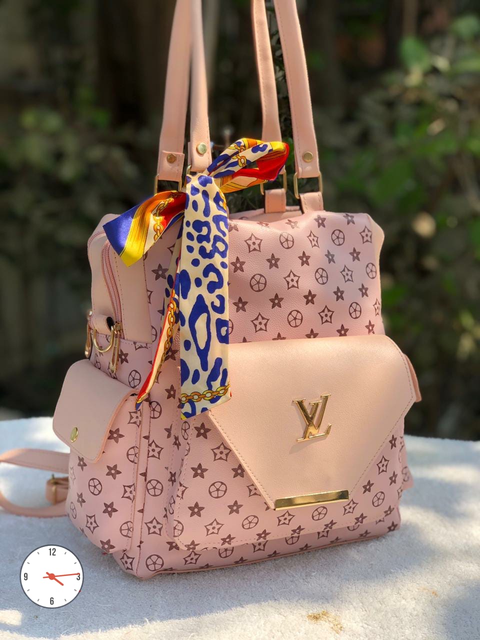 VersaLux: LV Switchable Backpack to Handbag